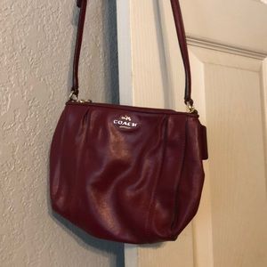 Red Coach crossbody 22 inch, waist length.